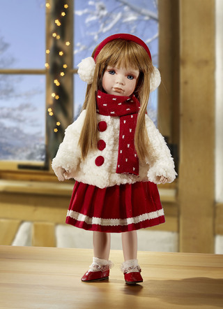 Porzellanpuppe mit winterlicher Kleidung