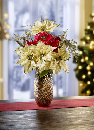 Poinsettia-Gesteck in Vase