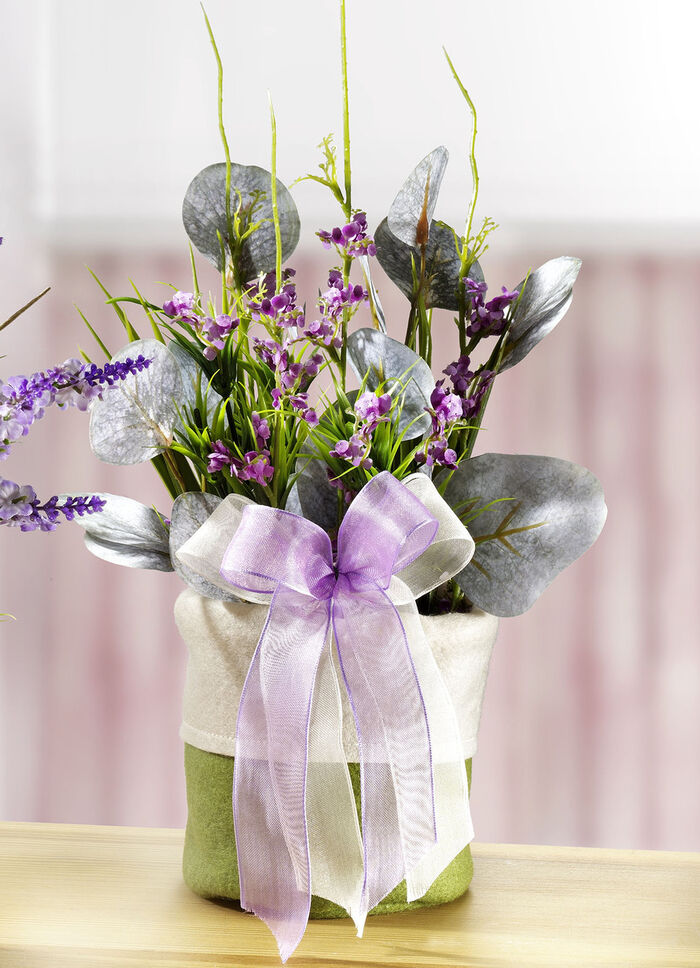 Frühlingsgesteck mit Blumen und Gräser im Filzbeutel GRÜN