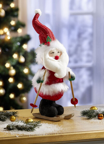 Weihnachtsmann auf Skiern 