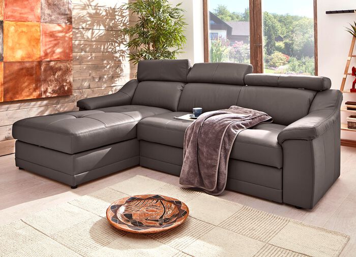 Frei im Raum aufstellbare Polsterecke mit Kopfteilverstellung 