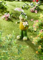 Schildkr&ouml;te mit Solar-Blume und Regenschirm 