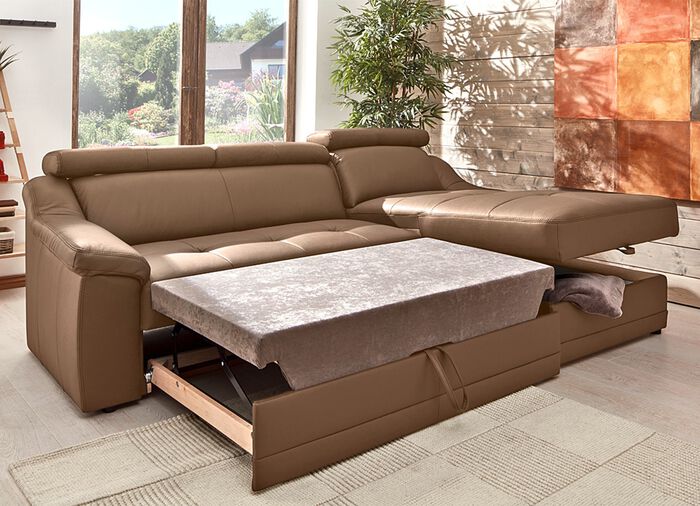 Frei im Raum aufstellbare Polsterecke mit Kopfteilverstellung 