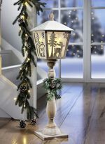 Beleuchtete Laterne mit Weihnachtsmotiven 
