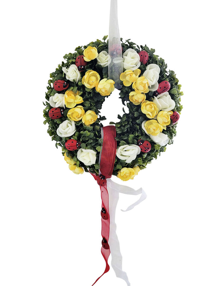 Wandkranz mit Ranunkeln und Marienkäfern 