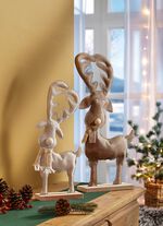 Rentier auf Holzsockel 